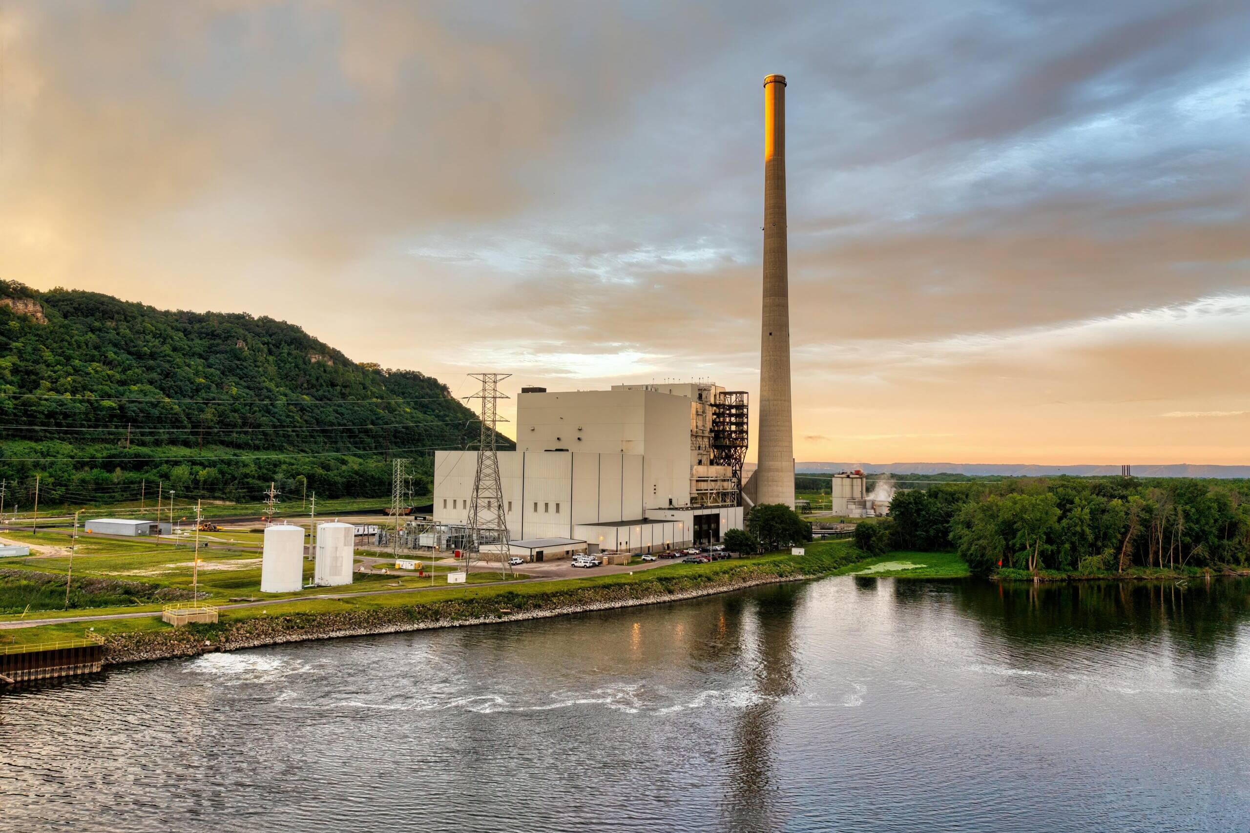 A power plant in Burnley, Lancashire, next to a bed of water.