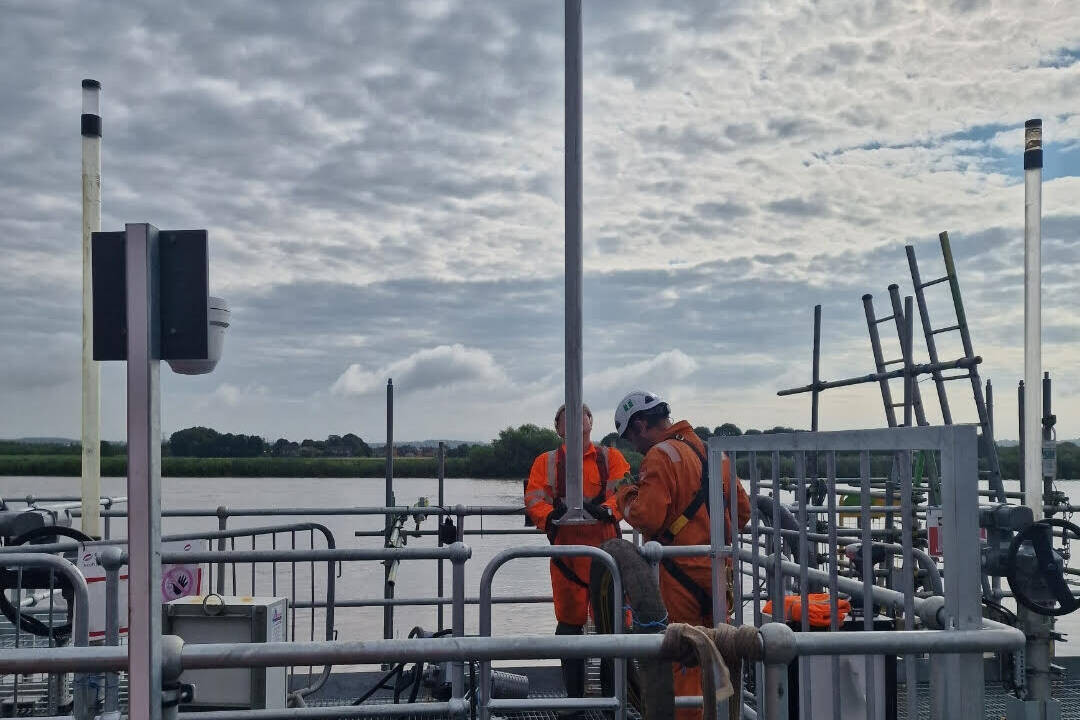 2 people working on a power station in hull.